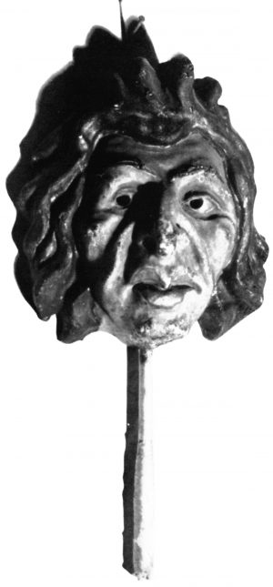 A mask on a stick